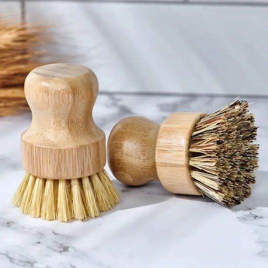 2 bamboo brushes on a marble counter