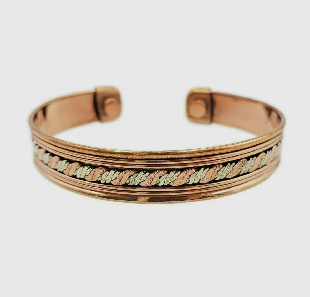 Rose gold and gold braided bracelet on a white background