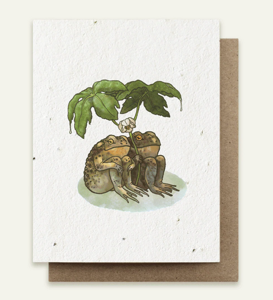 Greeting card with illustration of frogs and a plant, featuring a brown envelope.