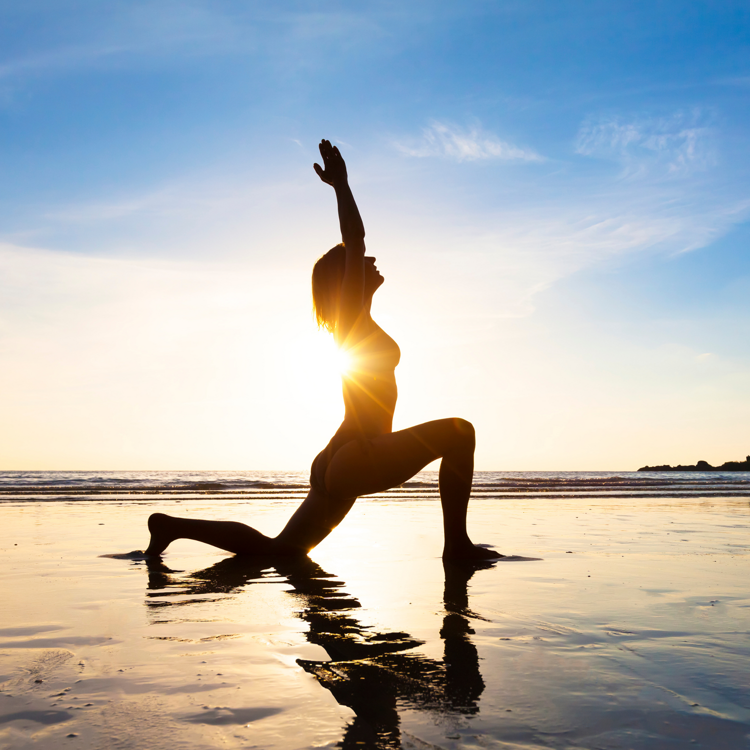Woman doing yoga pose at water's edge - stress relief supplements support natural calm and relaxation