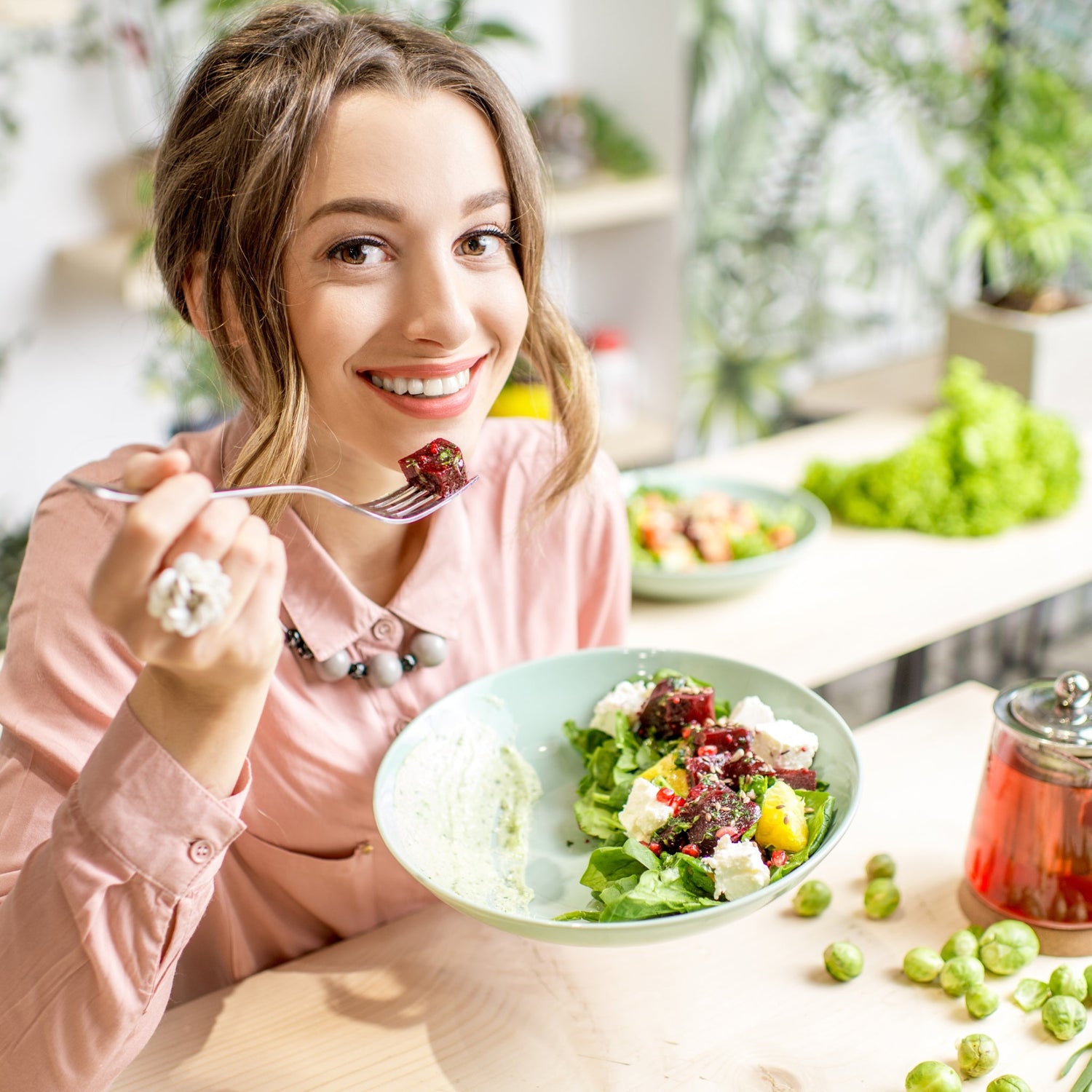 image of a woman enjoying healthy food for good digestive health