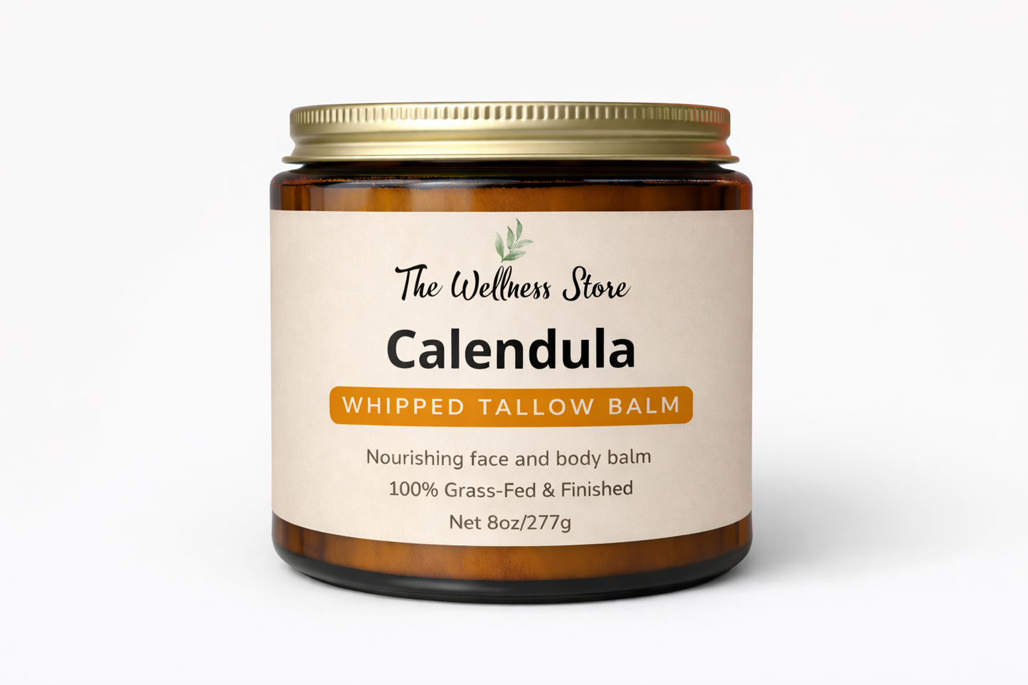 Jar of Calendula Whipped Tallow Balm from The Wellness Store on a white background