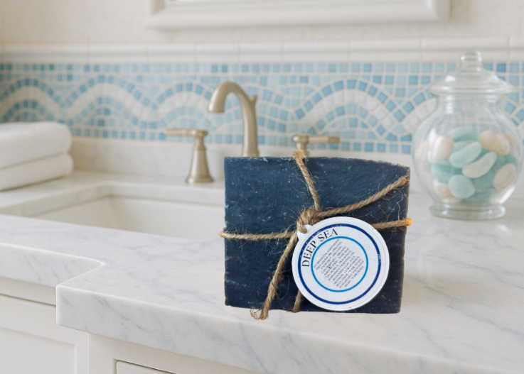 Bar of soap with a label on a bathroom counter
