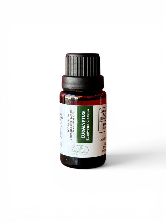 Eucalyptus therapeutic‑grade essential oil bottle from The Wellness Store on a white background