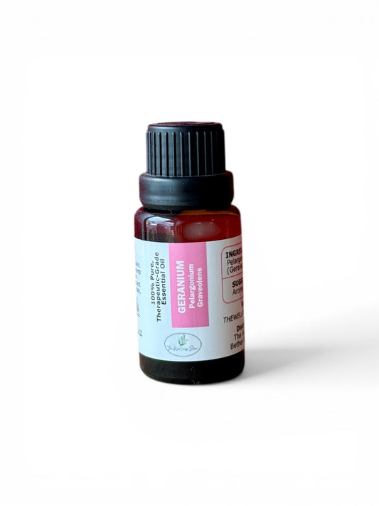 Geranium therapeutic‑grade essential oil bottle from The Wellness Store on a white background