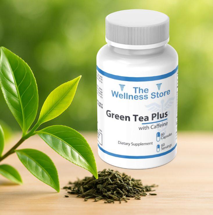 Bottle of 'Green Tea Plus' with caffeine from The Wellness Store on a wooden surface with green leaves.