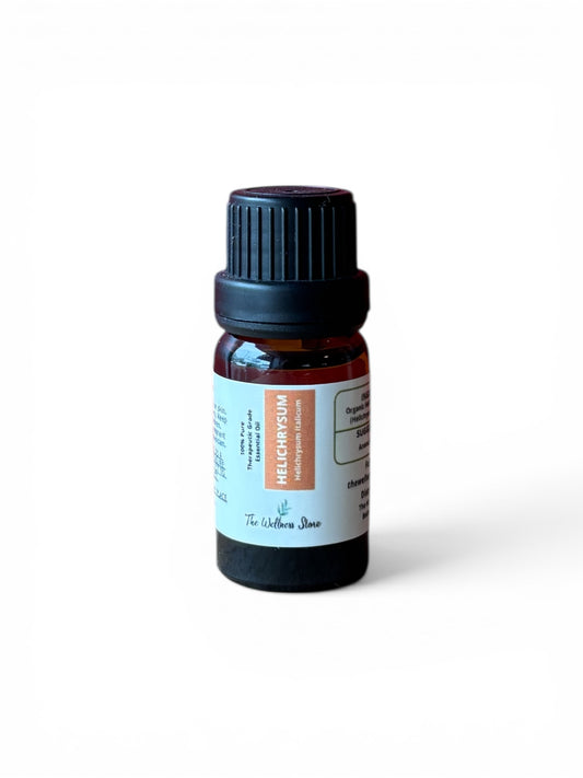 Helichrysum therapeutic‑grade essential oil bottle from The Wellness Store on a white background