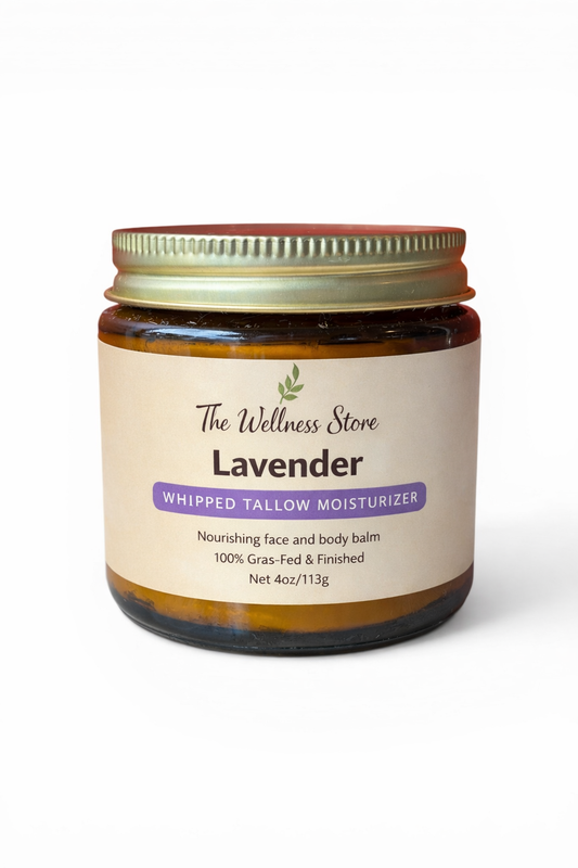 Jar of lavender whipped tallow moisturizer from The Wellness Store on a white background