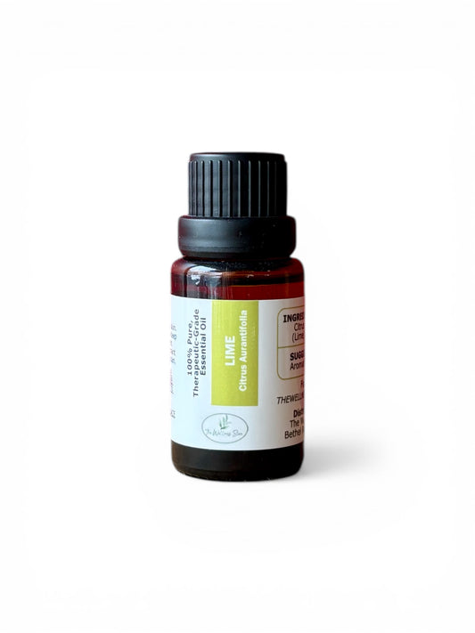 Lime therapeutic‑grade essential oil bottle from The Wellness Store on a white background