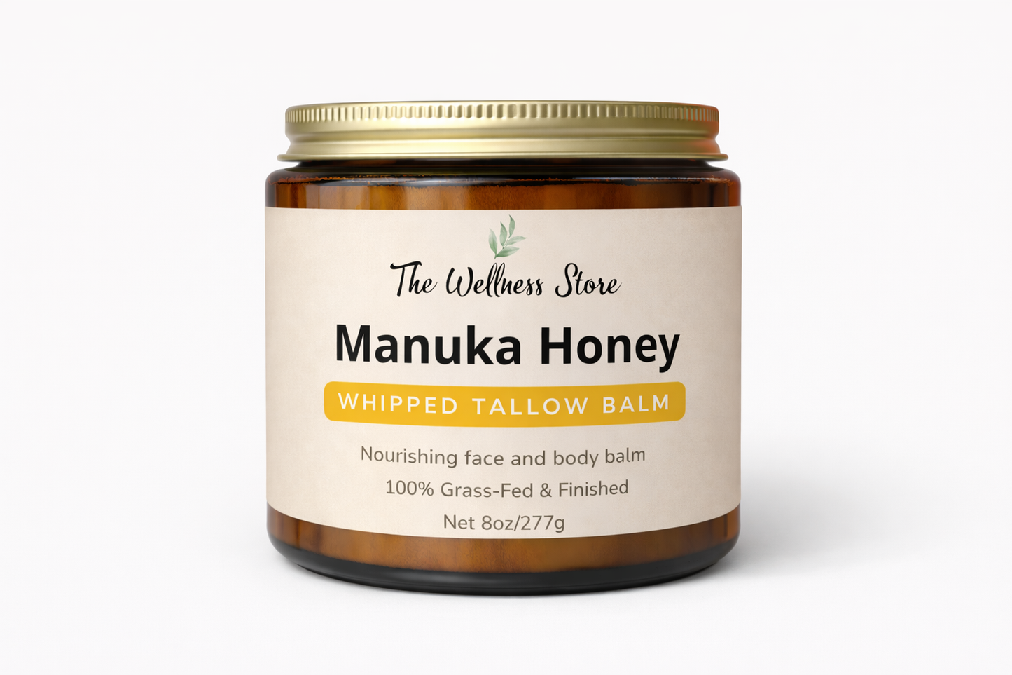 Jar of Manuka Honey Whipped Tallow Balm from The Wellness Store on a white background