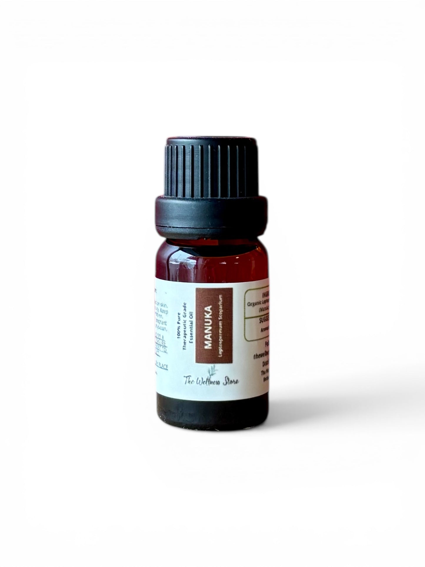 Manuka therapeutic‑grade essential oil bottle from The Wellness Store on a white background