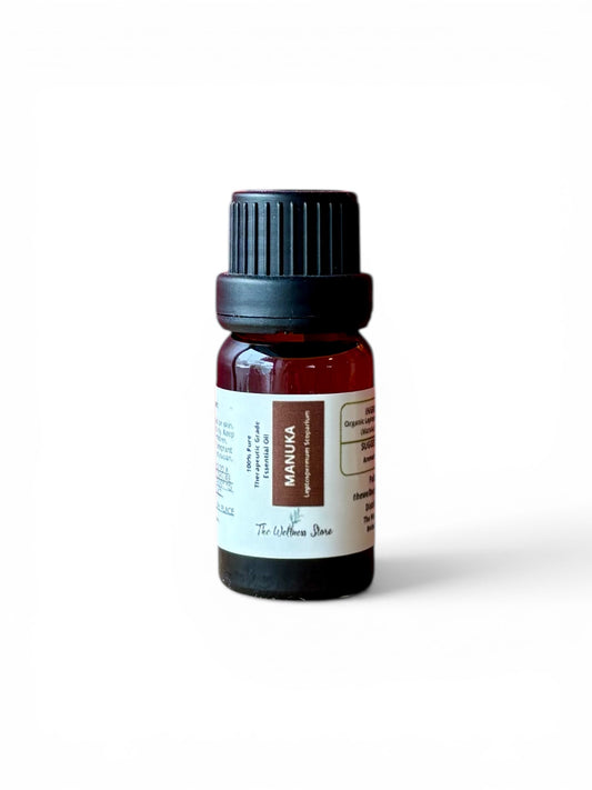 Manuka therapeutic‑grade essential oil bottle from The Wellness Store on a white background