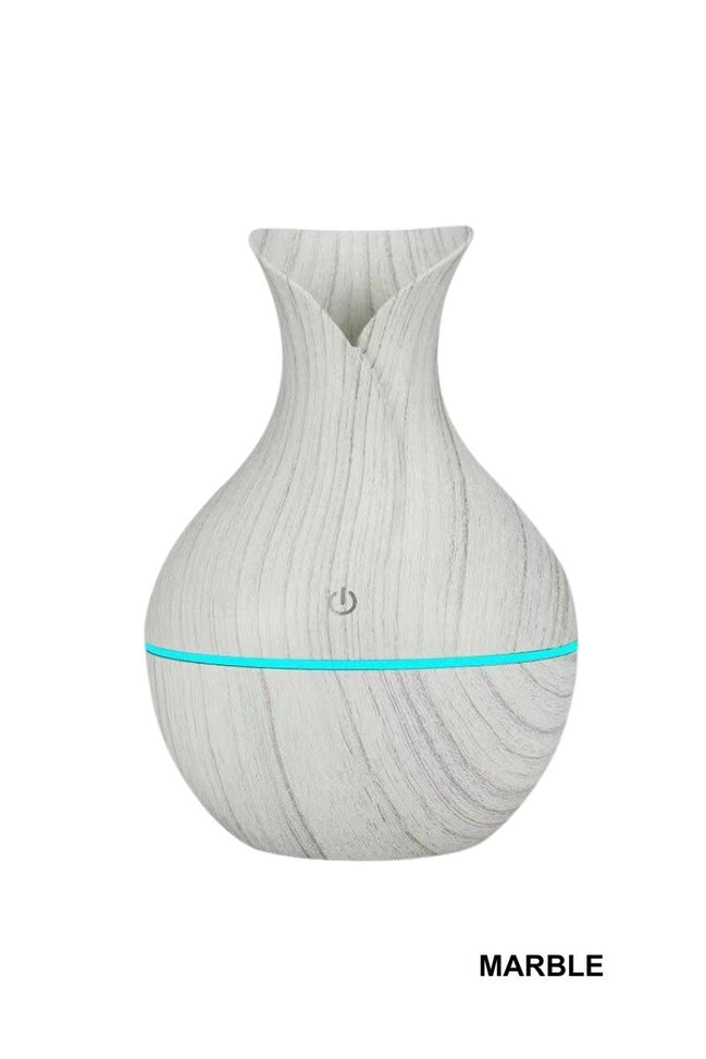 Marble-look petal-shaped ultrasonic aroma diffuser with LED accent