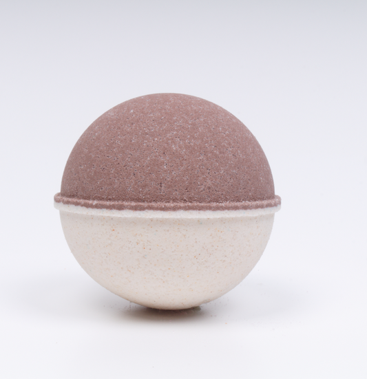 Oatmeal milk & honey bath bomb on a white background