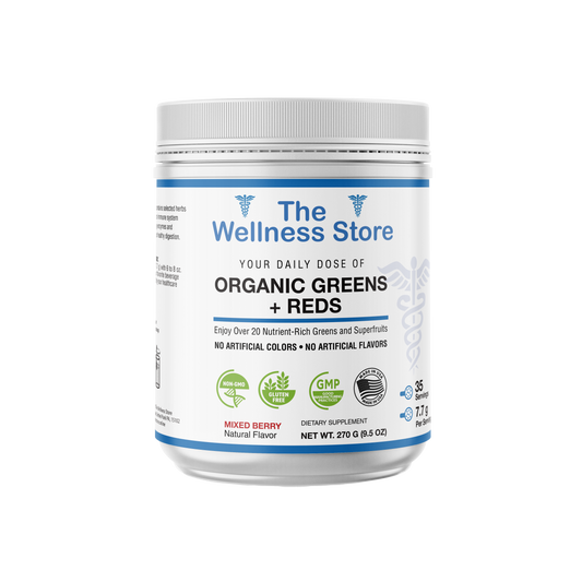 Container of 'The Wellness Store' organic greens and Reds supplement on a white background