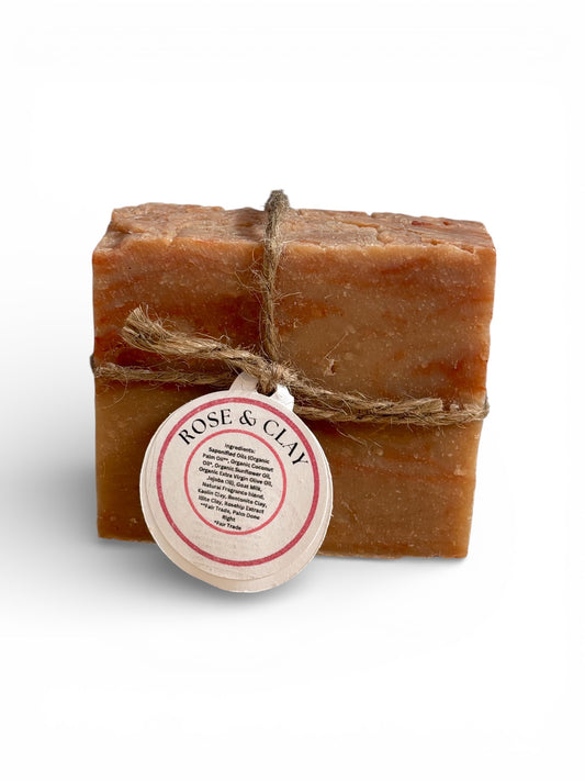 bar of Rose and Clay goatmilk soap on a white background