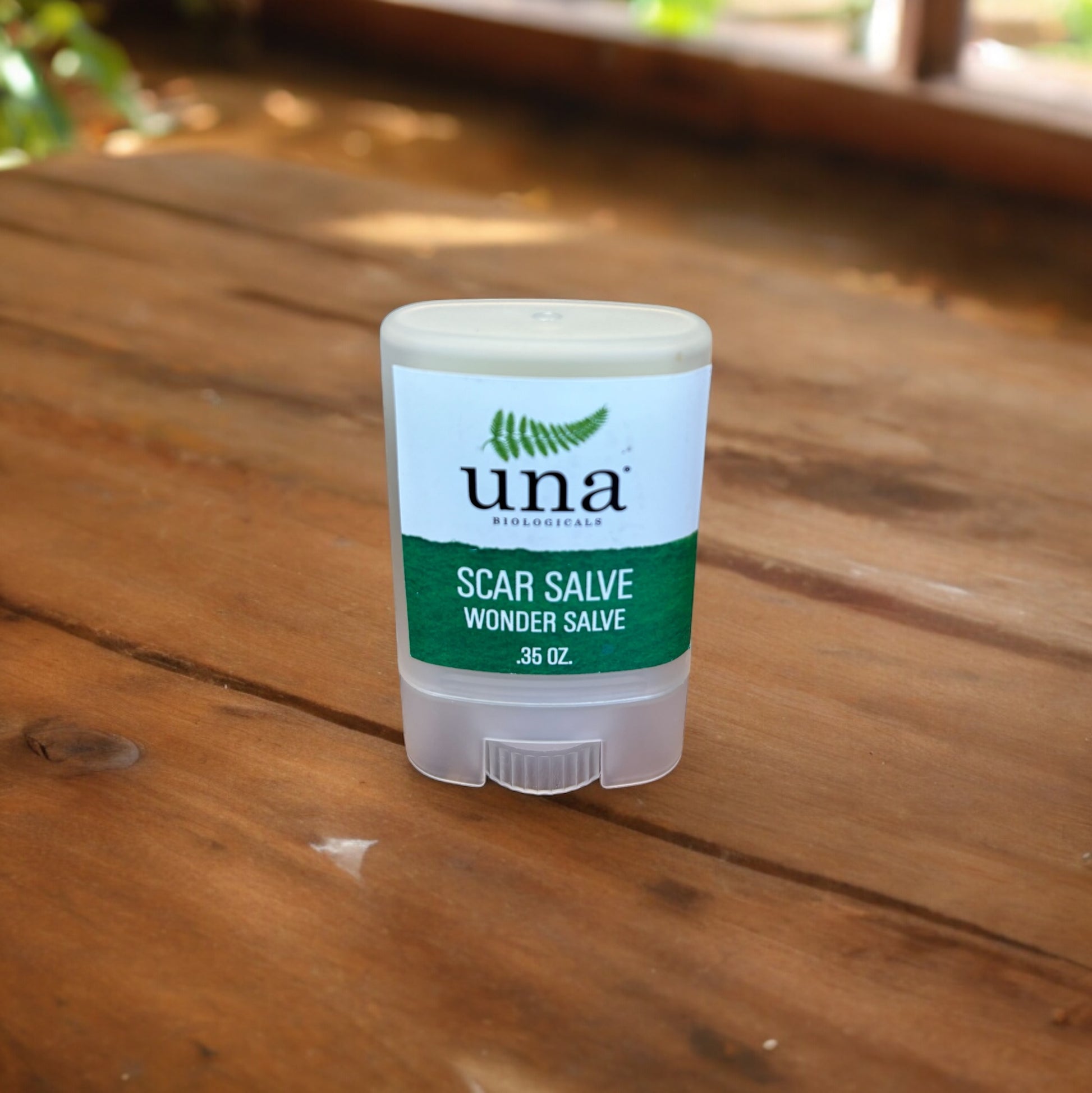 scar salve on a wooden background for scar reduction