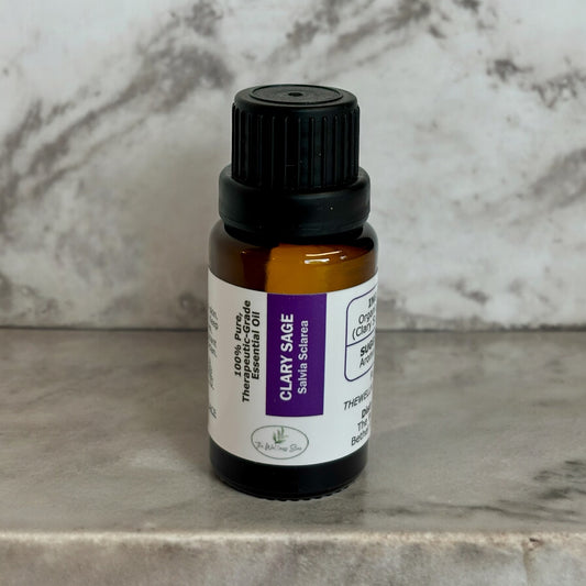 Clary Sage oil from the wellness store on a marble shelf with a marble background
