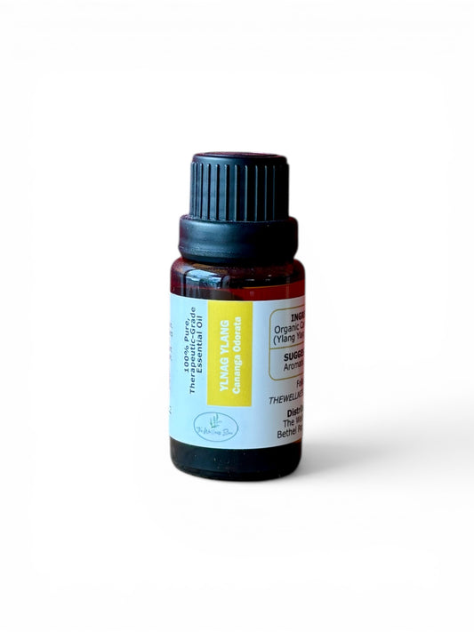 Ylang Ylang therapeutic‑grade essential oil bottle from The Wellness Store on a white background
