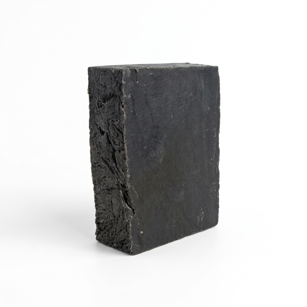Single Activated Charcoal with Lemongrass Natural Soap bar on a white background